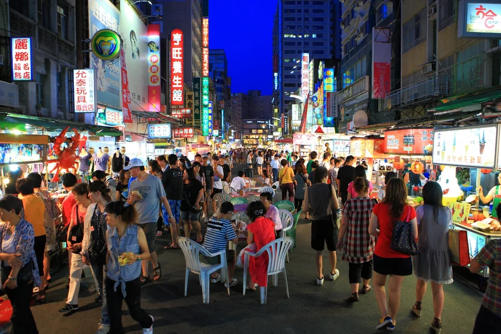 Evening crowds and illuminated food stalls at Liuhe Night Market